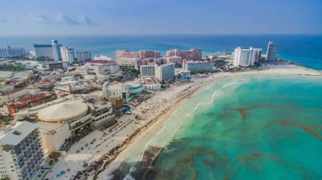 Cancun is a Beautiful city. As we see it is surrounded by Wonderdull Bluish Beach.