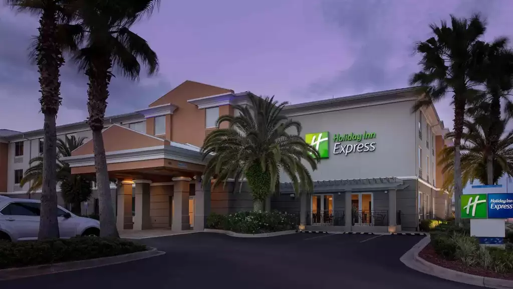 Holiday Inn Hotel of Jacksonville looking beautiful with a colorful building and trees