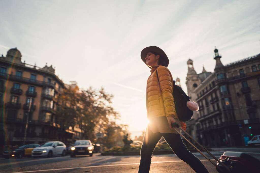 The Weather of Barcelona in October a sunset view and running cars