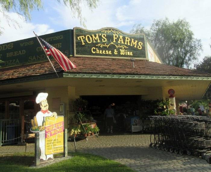 A building with green board and the picture of a animated chef, Glen Ivy Hot Springs