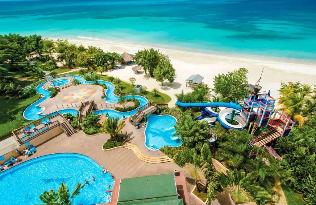 Resort & Spa in Beaches Negril is a sunning Luxuar resort, it has a big sea & several Pools which is surrounded by Trees.