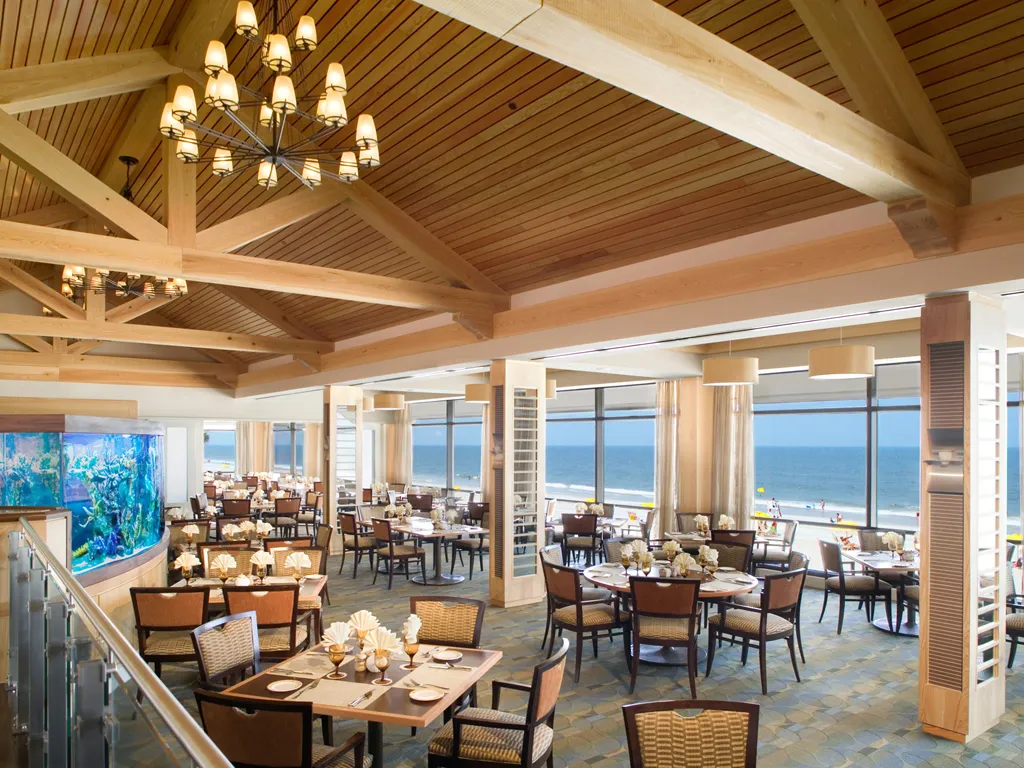 The beautiful inside view of Ponte Vedra Inn club a setting of tables is set in decent way
