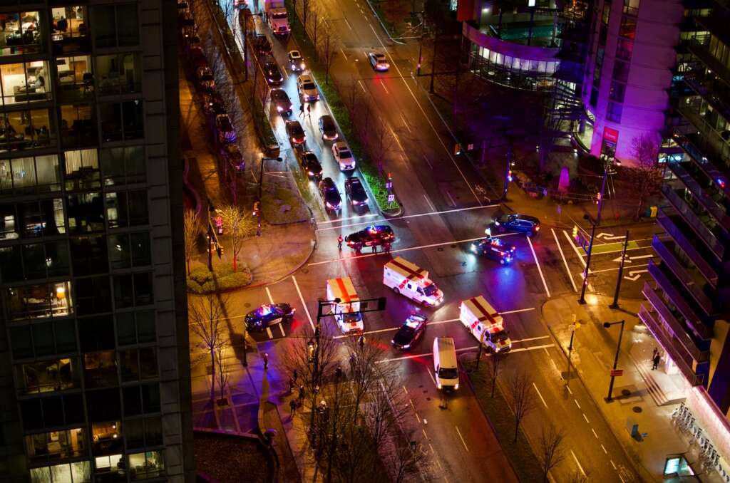 cars on road during night time in Yaletown looks beautiful. If you are traveling for the first time and looking for where to stay in Vancouver. Yaletown is an excellent location