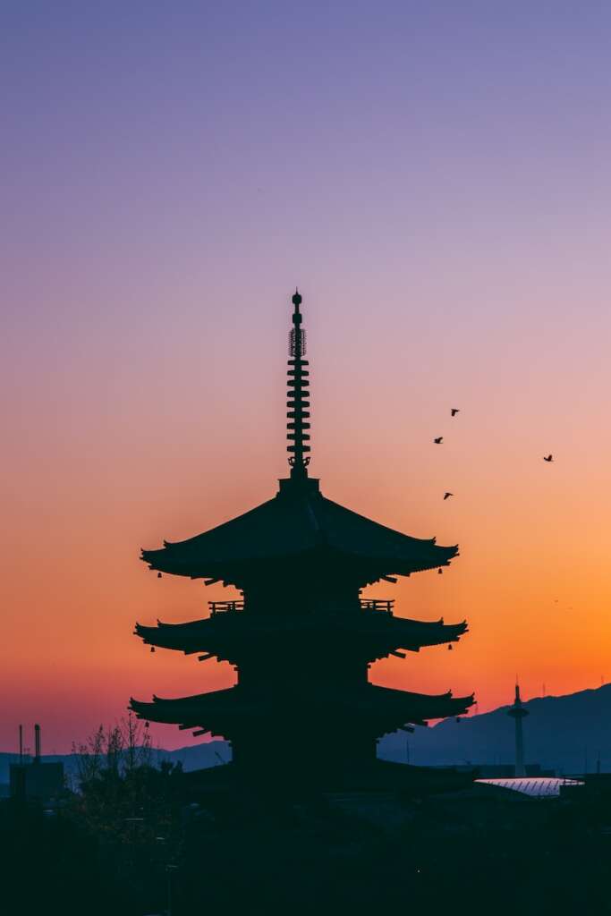 The Mastue city : the city of japan. The Picture of sunset view within a building shaded black colour is seen as well.
