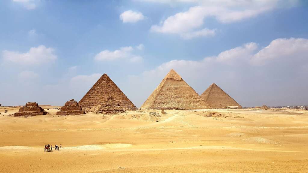 Peak Tourist Seasons in Egypt: The brown pyramid under blue sky during daytime
