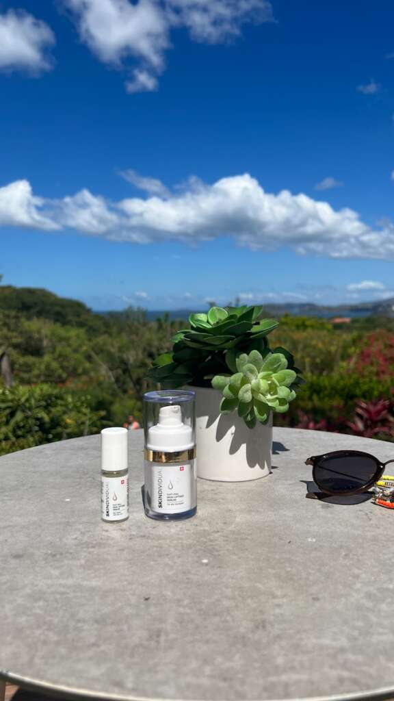 We are exploring the best time to visit in Costa rica. In the display a table with a potted plant and a pair of sunglasses on top of it that's it.